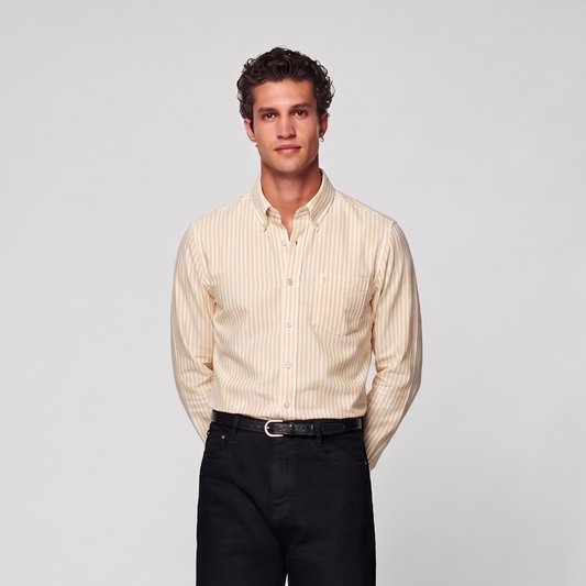 Male model wearing pastel yellow striped Oxford shirt for men