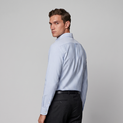 Back view of male model wearing premium sky blue striped Oxford shirt