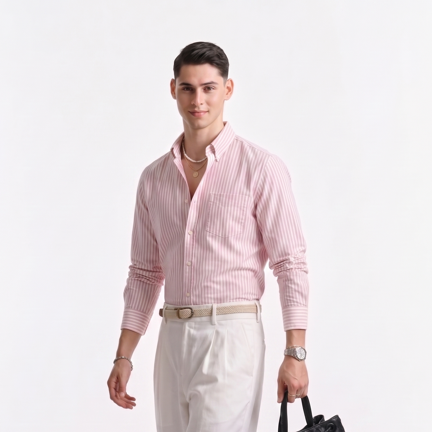 Side profile of male model wearing soft pink striped Oxford shirt