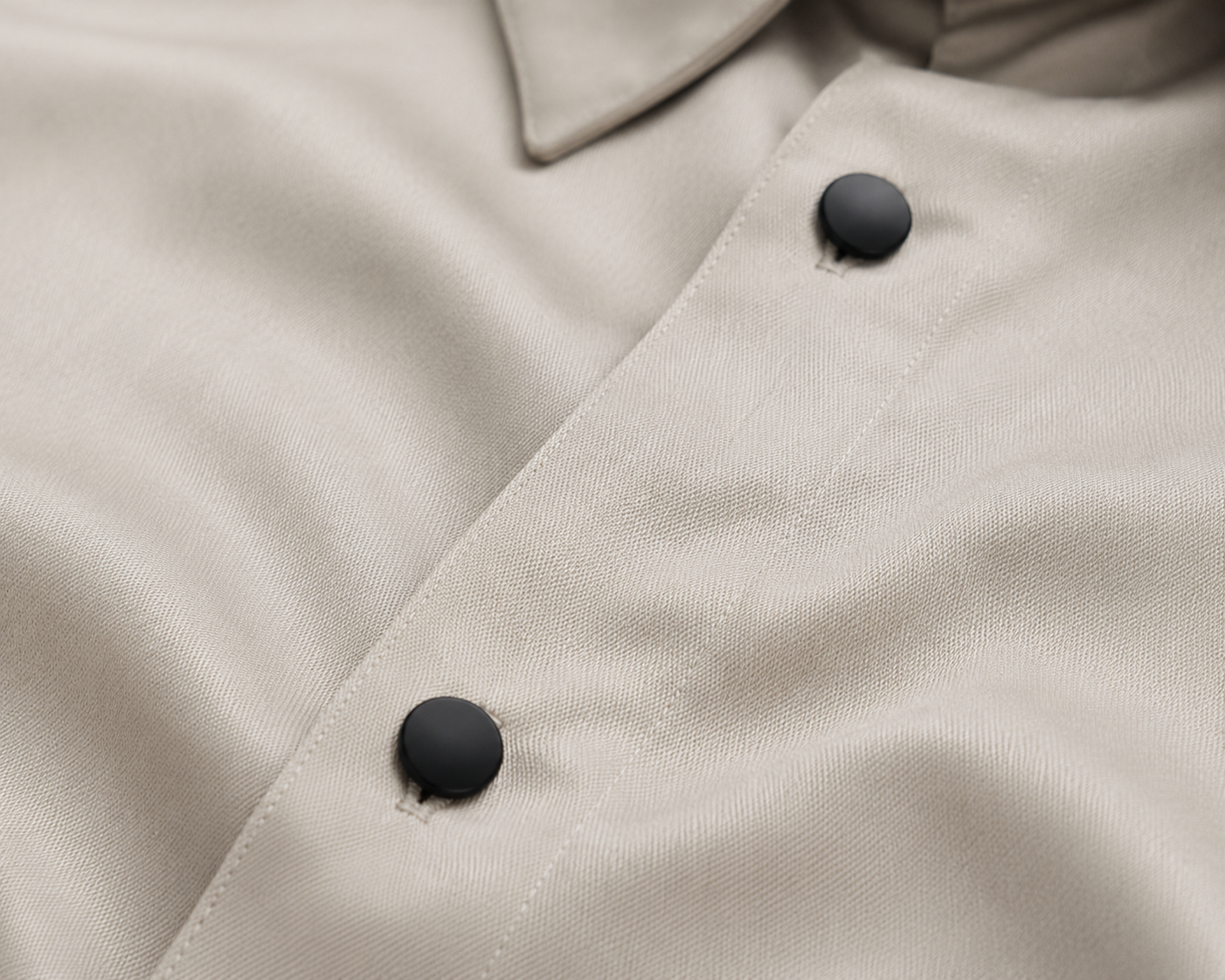 Close Up View of Premium Pearl Grey Satin Shirt Fabric and Black Buttons